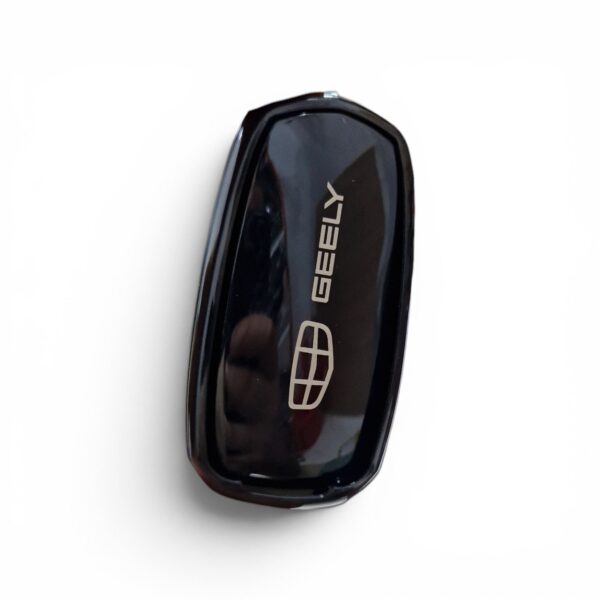 2026/07/1000071689.jpg Couvre clé silicone Geely Gx3 Pro